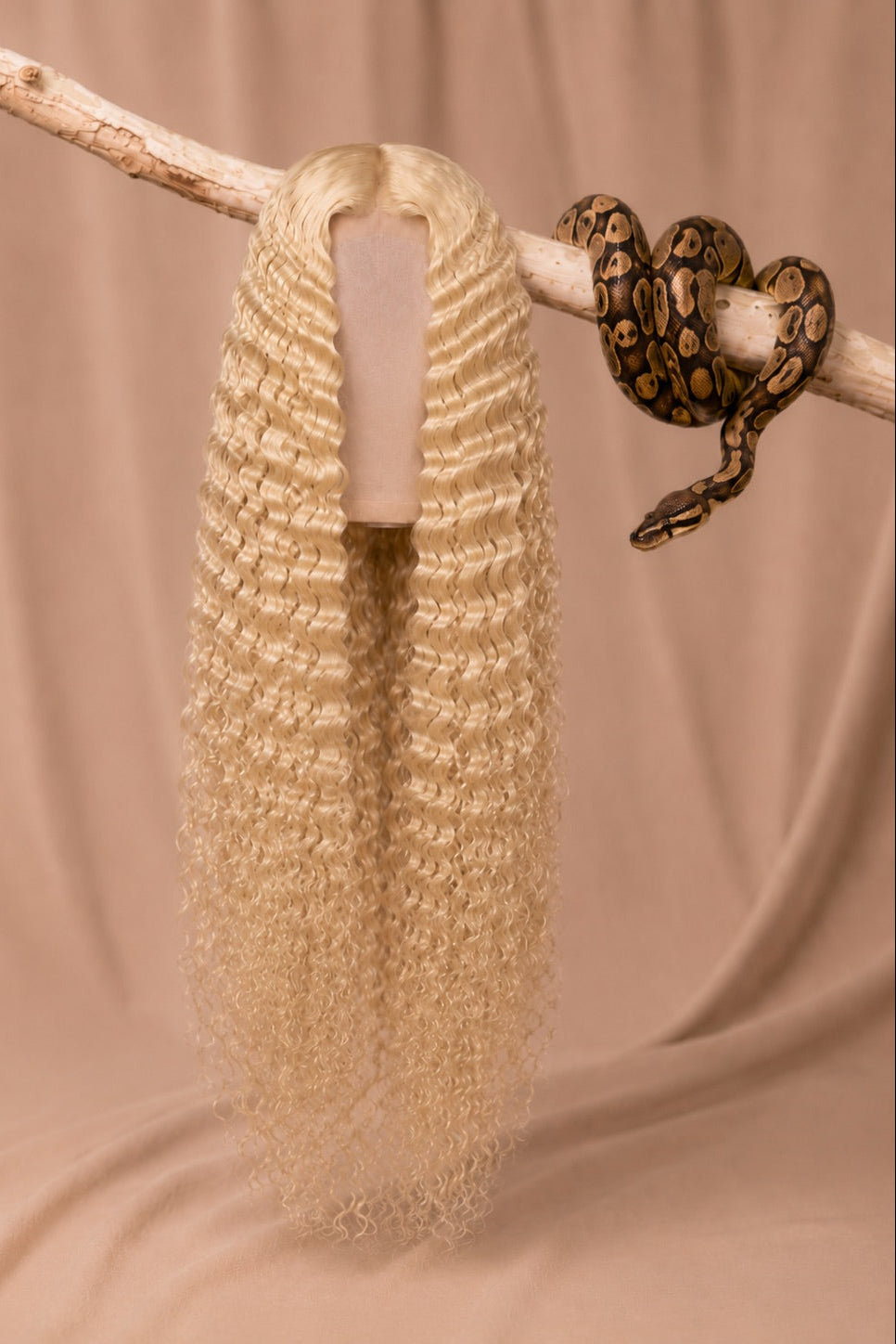 613 Python Curl Deep Wave 5x5 HD Lace Closure Wig in Platinum Blonde front view human hair wig texture